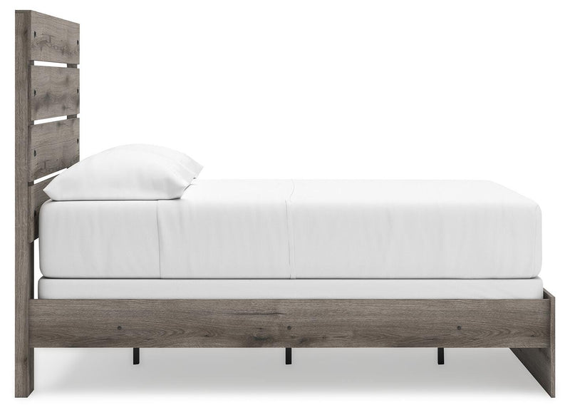 Graystorm bedroom set by Ashley Furniture, featuring a modern bed frame with matching nightstands and storage accents.