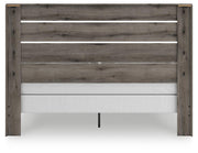 Graystorm bedroom set by Ashley Furniture, featuring a modern bed frame and matching furniture, shown from the back view.