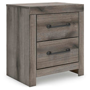 Graystorm bedroom set by Ashley Furniture featuring a stylish bed frame, matching nightstands, and coordinated bedroom furniture.