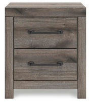 Graystorm bedroom set by Ashley Furniture featuring a bed with a headboard and matching bedroom furniture in a modern style.