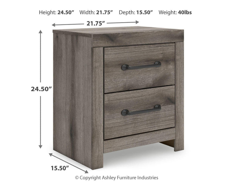 Graystorm bedroom set by Ashley Furniture featuring a bed, nightstands, and dresser in a modern, gray finish.