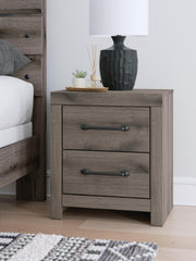 Graystorm bedroom set by Ashley Furniture featuring a modern bed frame, matching nightstands, and coordinated bedroom furniture.