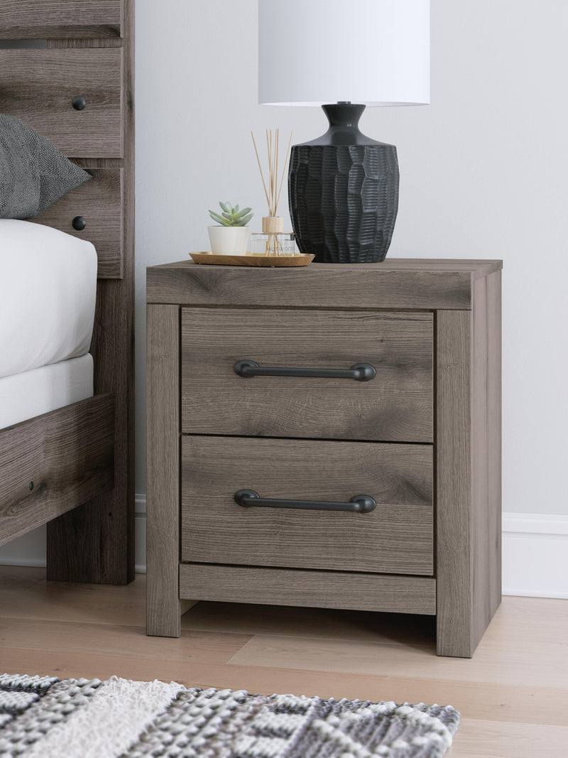 Graystorm bedroom set by Ashley Furniture featuring a modern bed frame, matching nightstands, and coordinated bedroom furniture.