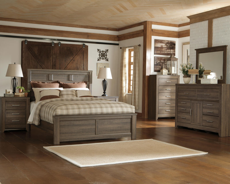 Ashley Furniture Juararo bedroom set with a modern bed frame, matching nightstands, and coordinating dresser in a stylish bedroom.