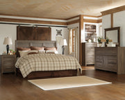 Ashley Furniture Juararo bedroom set with a bed, dresser, and nightstands in a modern wood finish.
