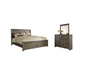 Ashley Furniture Juararo bedroom set with a modern bed frame, matching dressers, and bedside tables in a stylish bedroom display.