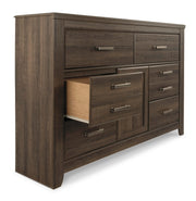 Ashley Furniture Juararo dresser and mirror set with the dresser open to show drawers and the mirror attached, white finish and modern design.