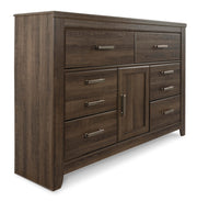 Ashley Furniture Juararo dresser with multiple drawers, showcasing a modern design and dark wood finish.