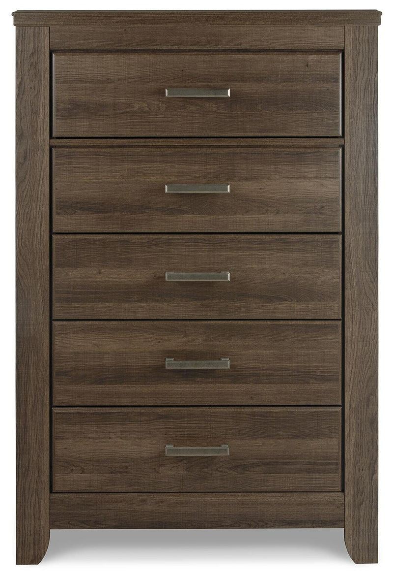 Ashley Furniture Juararo chest of drawers with a dark wood finish and sleek metal handles, shown from a front head-on view.