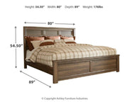 Ashley Furniture Juararo bedroom set with a modern bed frame, matching nightstands, and stylish decor in a cozy bedroom setting.
