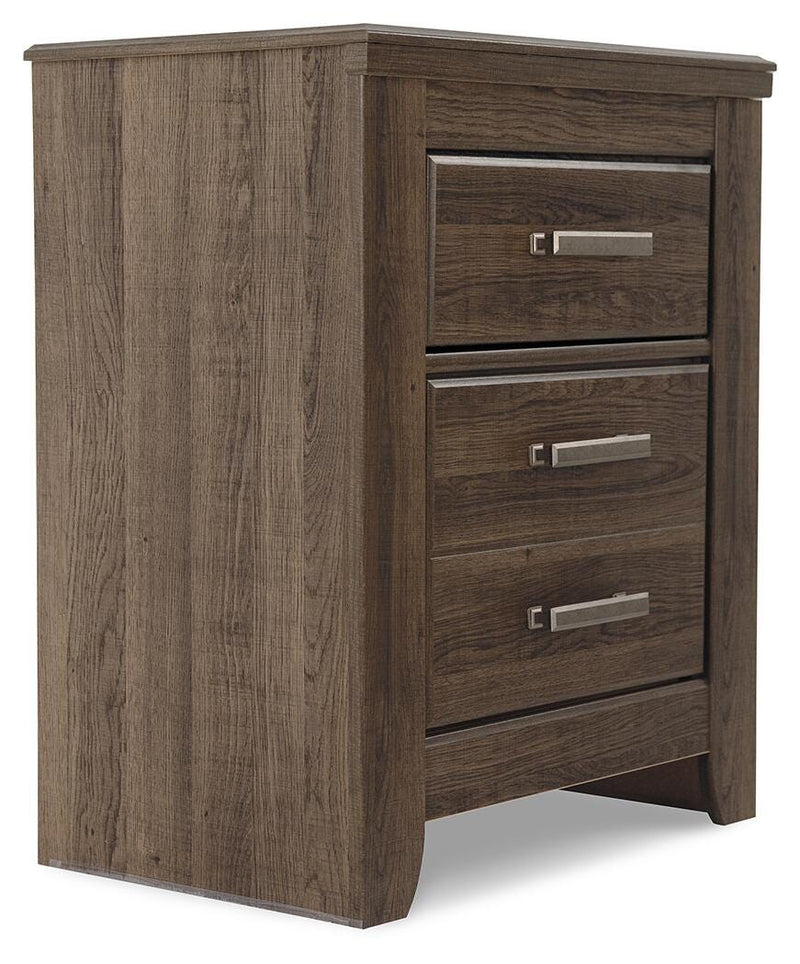 Ashley Furniture Juararo nightstand with a dark wood finish and modern design, shown from an angled view.
