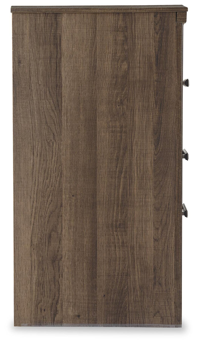 Ashley Furniture Juararo nightstand with a dark wood finish and sleek drawer handle, shown from a side angle.