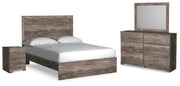 Ashley Furniture Ralinksi bedroom set with a large bed, matching nightstands, and a sleek dresser in a modern bedroom design.