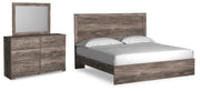 Ashley Furniture Ralinksi bedroom set featuring a bed frame, nightstands, and dresser with a modern design in a stylish bedroom.