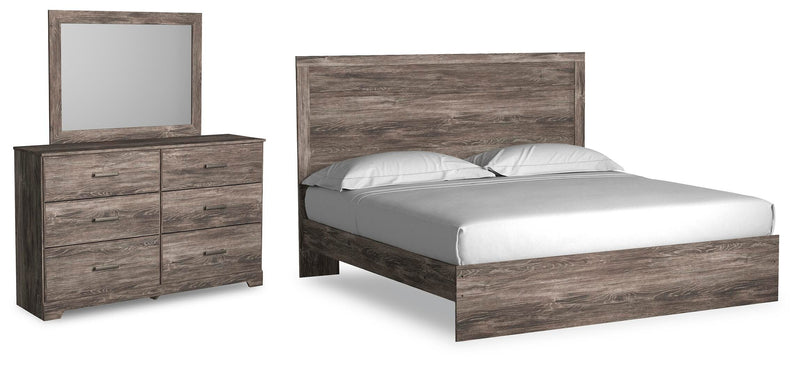 Ashley Furniture Ralinksi bedroom set featuring a bed frame, nightstands, and dresser with a modern design in a stylish bedroom.