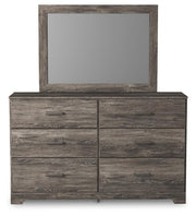 Ashley Furniture Ralinksi bedroom set with a stylish headboard, featuring elegant wood finish and contemporary design.