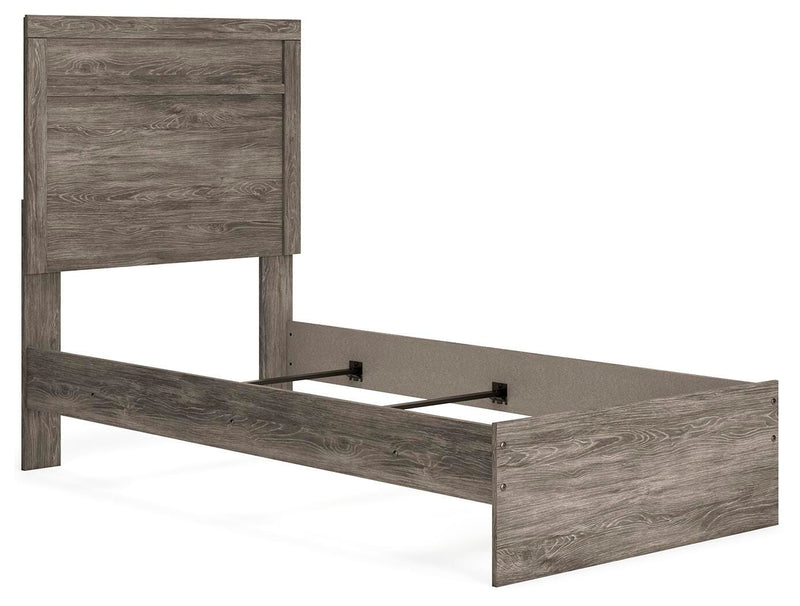 Ashley Furniture Ralinksi Bedroom Set featuring a bed, nightstands, and dresser with modern design in neutral tones.