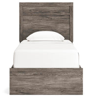 Ashley Furniture Ralinksi bedroom set with a headboard and matching furniture, featuring modern design and neutral finish.
