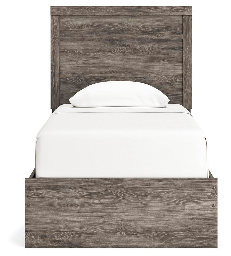 Ashley Furniture Ralinksi bedroom set with a headboard and matching furniture, featuring modern design and neutral finish.