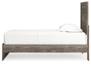 Ashley Furniture Ralinksi bedroom set with matching bed frame, nightstands, and dresser in a modern, elegant design.