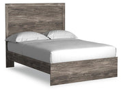 Ashley Furniture Ralinksi bedroom set with a stylish bed, nightstands, and dresser in a modern bedroom arrangement.