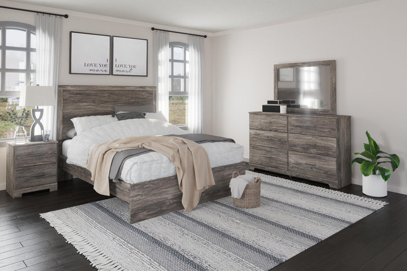 Ashley Furniture Ralinksi bedroom set with a modern bed frame, matching nightstands, and dresser in a stylish bedroom scene.