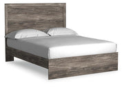 Ashley Furniture Ralinksi bedroom set shown from an angle, featuring a modern bed frame, matching nightstands, and stylish bedroom decor.