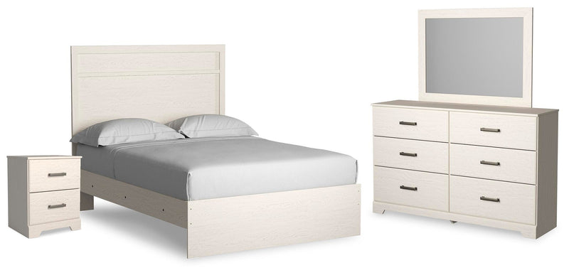 Ashley Furniture Stelsie Bedroom Set featuring a bed frame, nightstands, and dresser in a modern bedroom design.