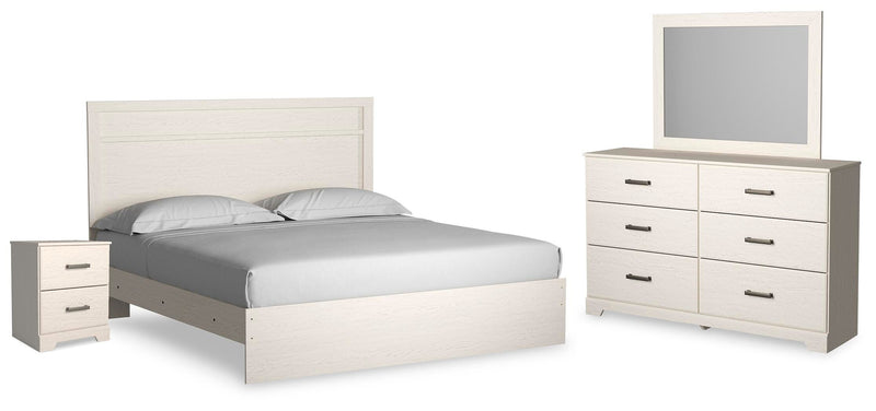 Ashley Furniture Stelsie bedroom set with matching bed frame, nightstands, and dresser in a modern bedroom scene.