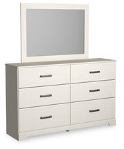 Ashley Furniture Stelsie bedroom set includes a bed frame, nightstands, and dresser, shown from an angled view in the image.