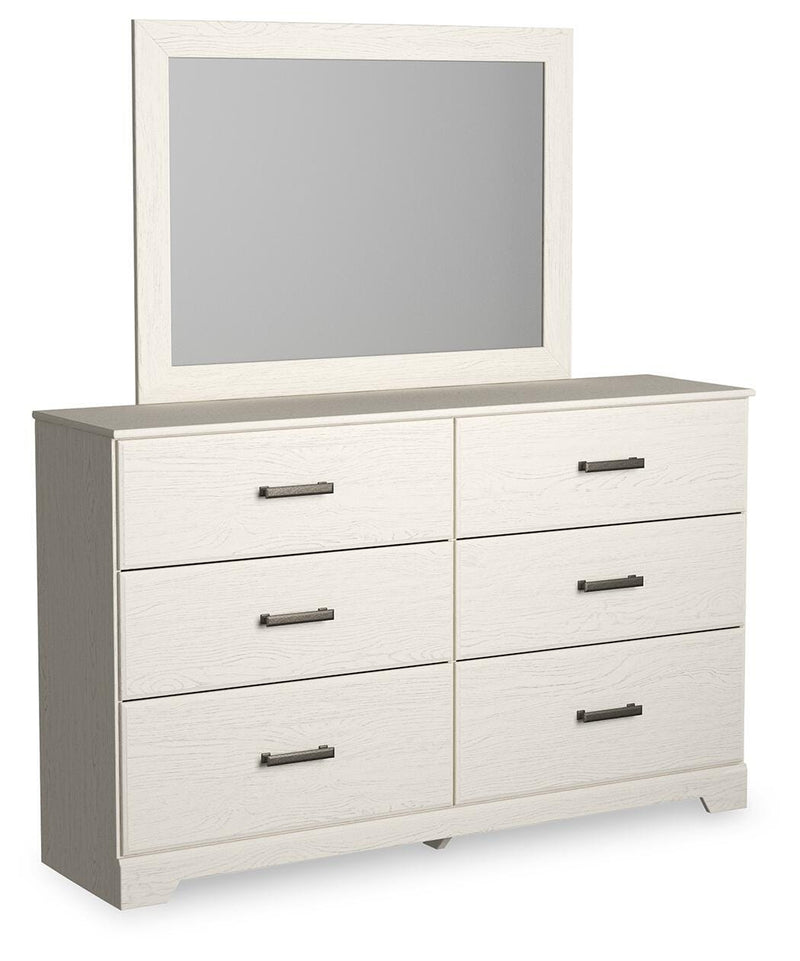 Ashley Furniture Stelsie bedroom set includes a bed frame, nightstands, and dresser, shown from an angled view in the image.
