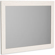 Ashley Furniture Stelsie bedroom mirror, angled view showing wooden frame and reflective glass surface.