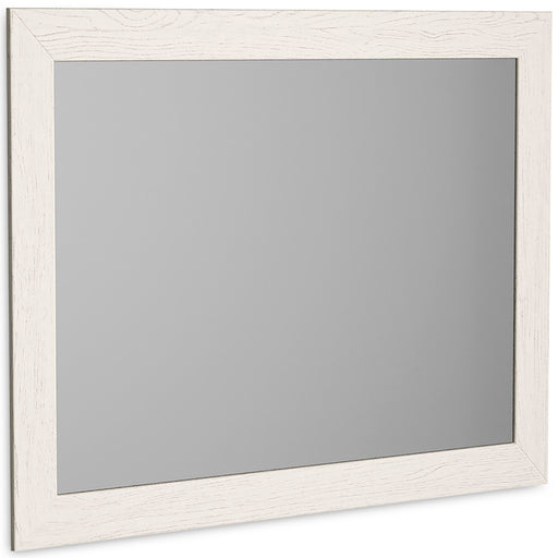 Ashley Furniture Stelsie bedroom mirror, angled view showing wooden frame and reflective glass surface.