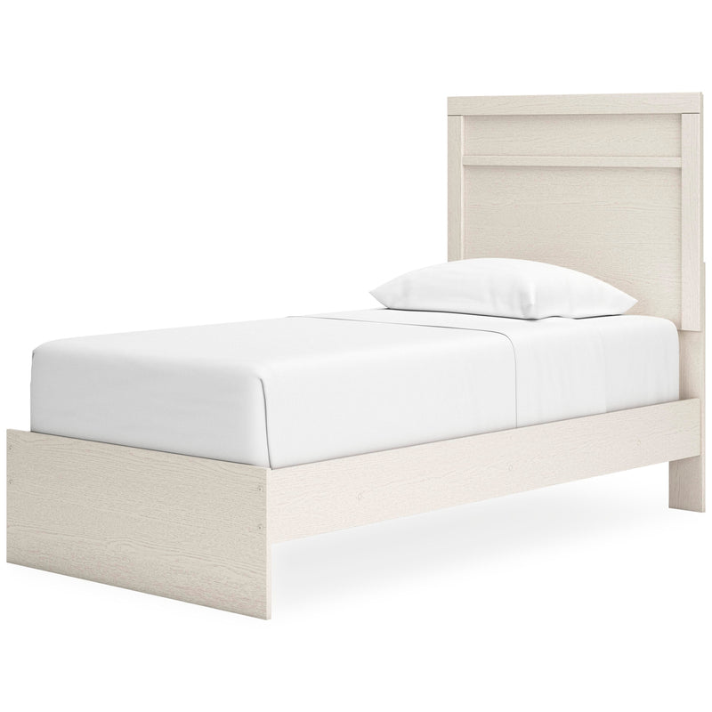 Ashley Furniture Stelsie bedroom set featuring a bed with a wooden headboard, matching nightstands, and a cozy bedroom scene.