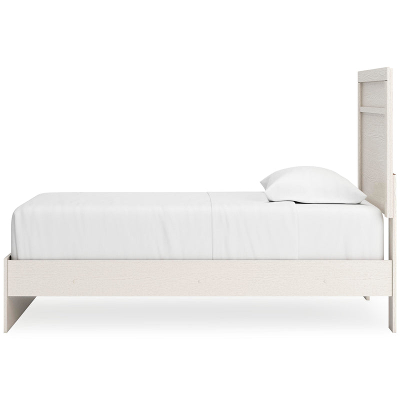 Ashley Furniture Stelsie Bed with a sleek wooden frame and modern design, shown from the side in a well-lit bedroom scene.