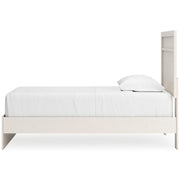 Ashley Furniture Stelsie bedroom set featuring a coordinated bed frame, nightstands, and dresser in a modern bedroom design.