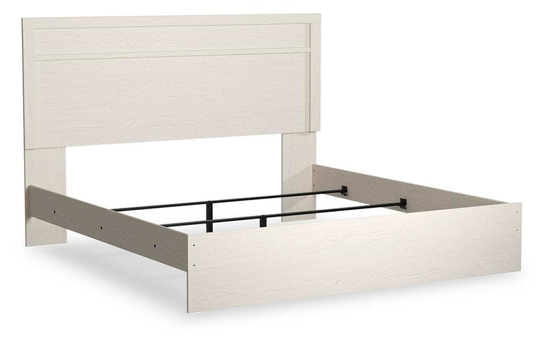 Ashley Furniture Stelsie Bed with a sleek wooden frame and modern design, shown from an angled view.
