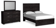 Ashley Furniture Belachime bedroom set includes a bed, dresser, and nightstands in a modern wood finish.