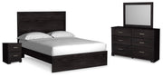 Ashley Furniture Belachime bedroom set with a modern bed frame, matching nightstands, and elegant bedroom furniture in a stylish design.