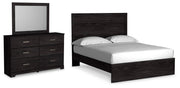 Ashley Furniture Belachime bedroom set with a bed, nightstands, and dresser in a modern bedroom scene.