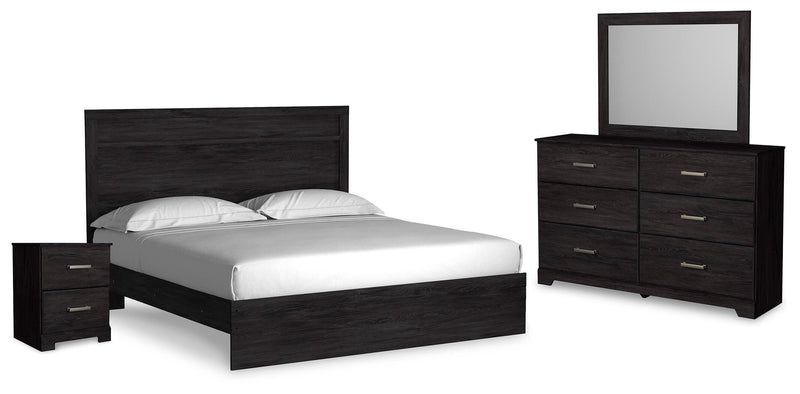 Ashley Furniture Belachime bedroom set featuring a bed frame, matching nightstands, and bedroom decor in a modern design.