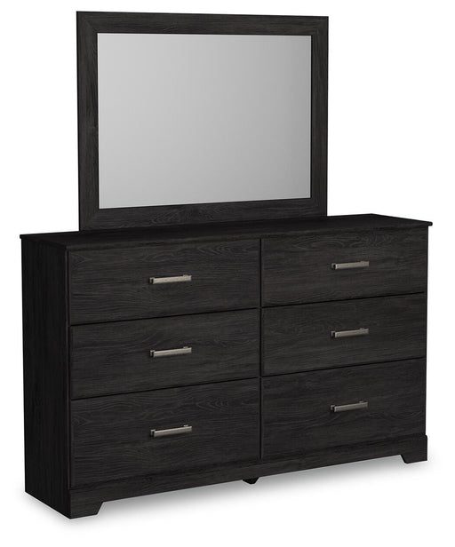 Ashley Furniture Belachime dresser with mirror, featuring a sleek wooden finish and modern design, shown from a side angle.