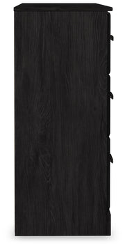 Ashley Furniture Belachime dresser with multiple drawers and a sleek wooden finish, shown from a side view.