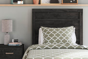 Ashley Furniture Belachime bed with a modern design, featuring a sleek headboard and sturdy wooden frame.