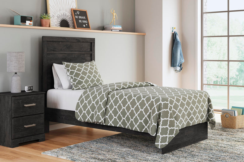 Ashley Furniture Belachime bedroom set, featuring a modern bed frame, matching nightstands, and dresser in a stylish bedroom display.