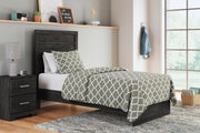 Ashley Furniture Belachime Bed with a wooden headboard and frame in a warm finish, showcasing a stylish and sturdy bedroom bed.
