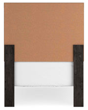 Ashley Furniture Belachime bedroom set with a bed frame, matching nightstands, and dresser in a modern bedroom scene.