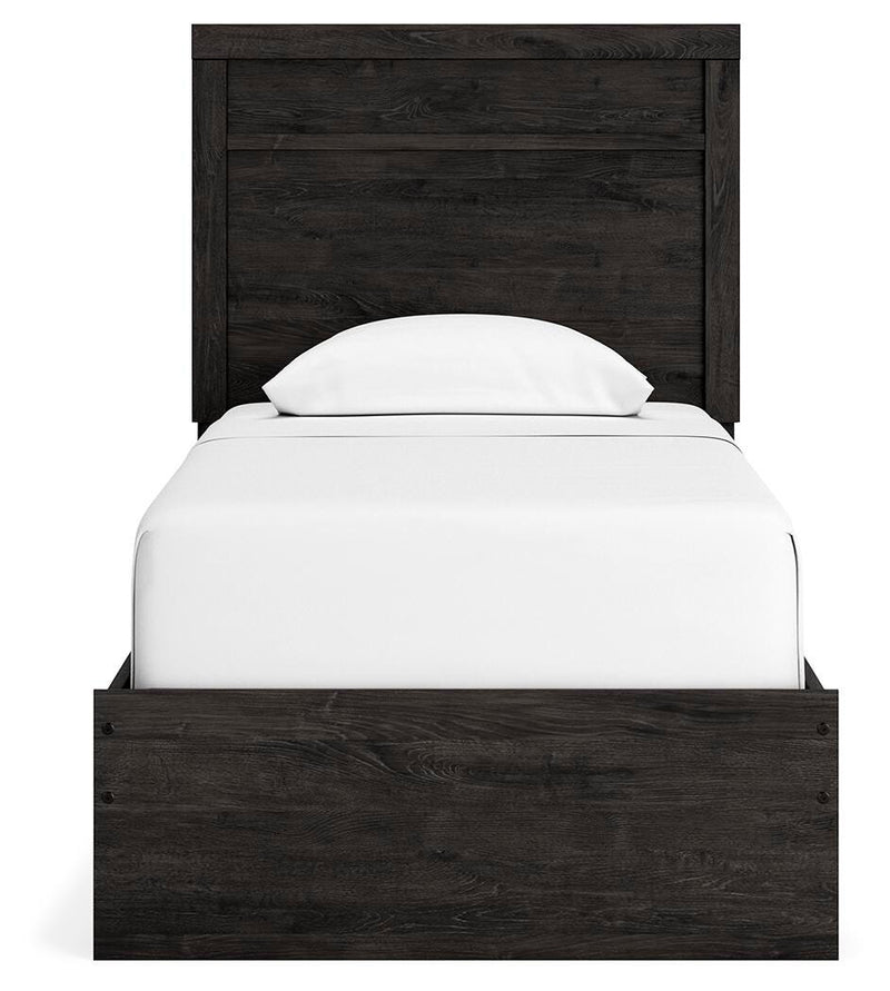Ashley Furniture Belachime Bed with a stylish headboard and rich wood finish, showcasing a modern bedroom design.