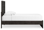 Ashley Furniture Belachime bedroom set featuring a modern bed frame, matching nightstands, and a coordinated dresser.