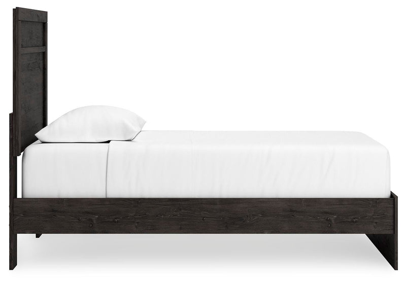 Ashley Furniture Belachime bedroom set featuring a modern bed frame, matching nightstands, and a coordinated dresser.